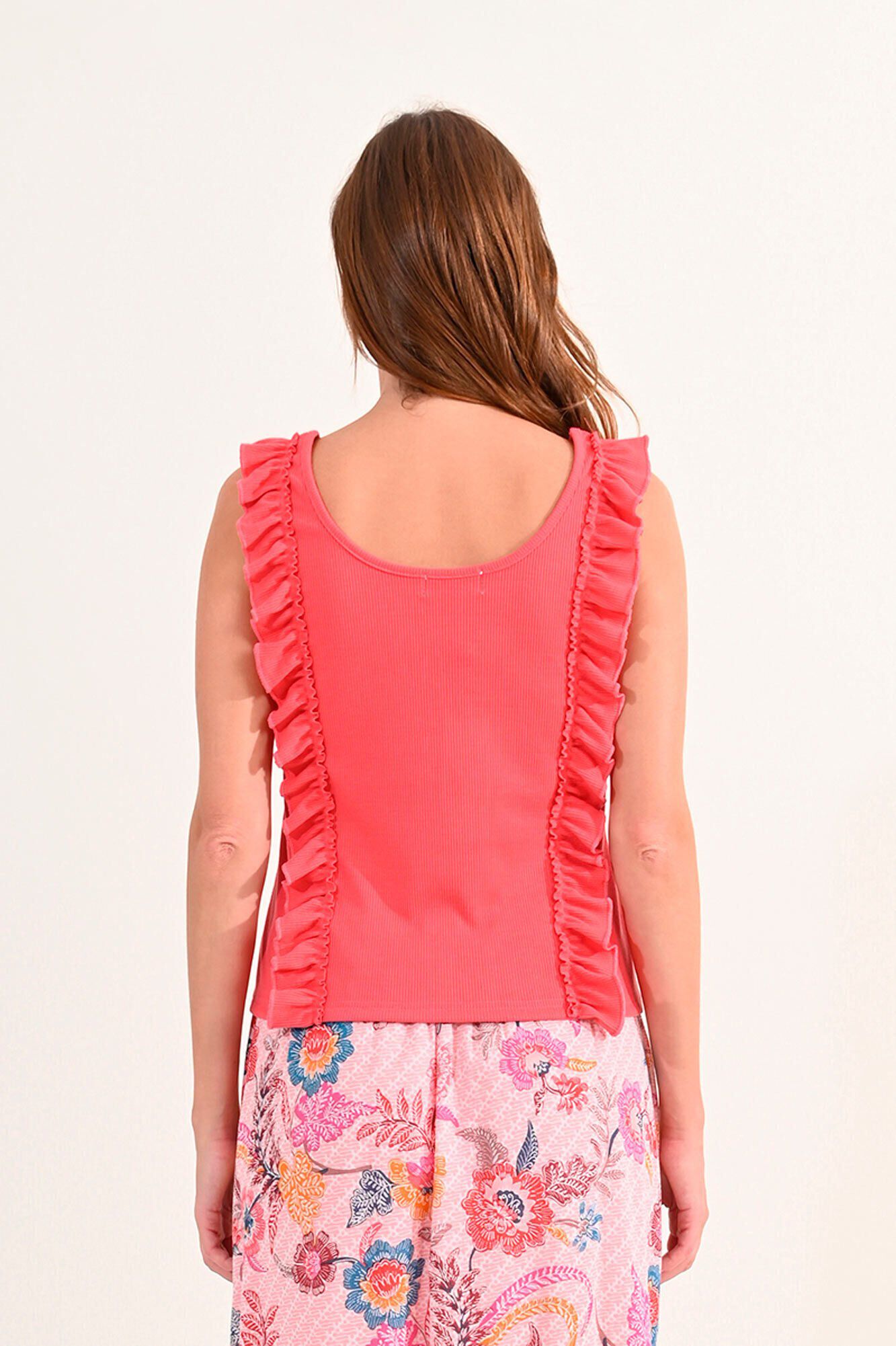 Molly Bracken Top de mulher sem manga com folhos