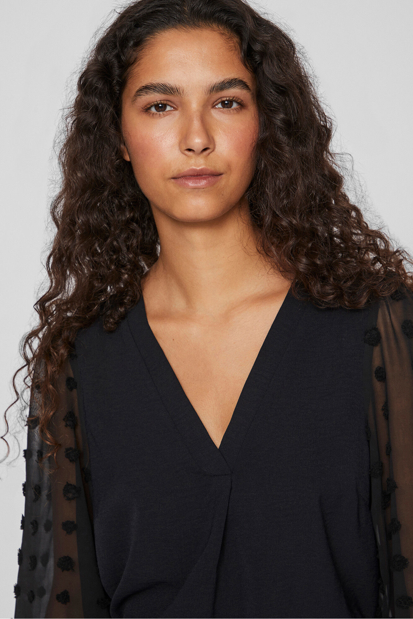 Vila Blusa com plumeti nas mangas