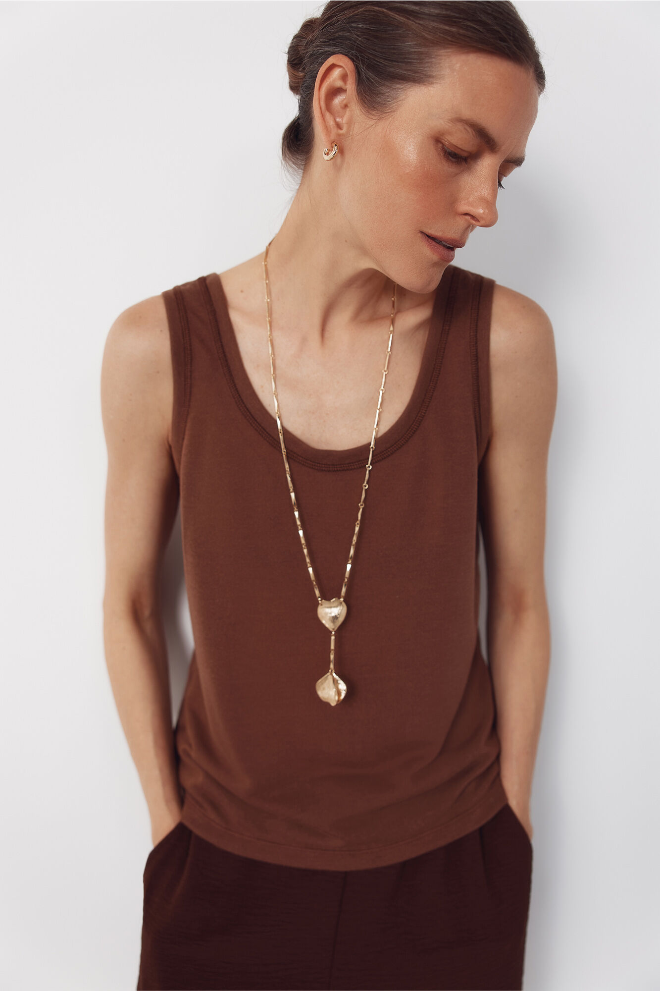 Cortefiel -Striped rustic fabric vest top<br>-Round neck<br>-Fluid silhouette<br>-Elastic and comfortable fabric