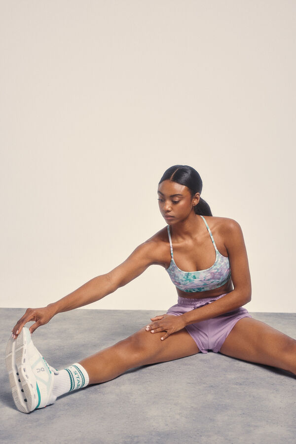 Dash and Stars Top esportivo com estampa floral verde