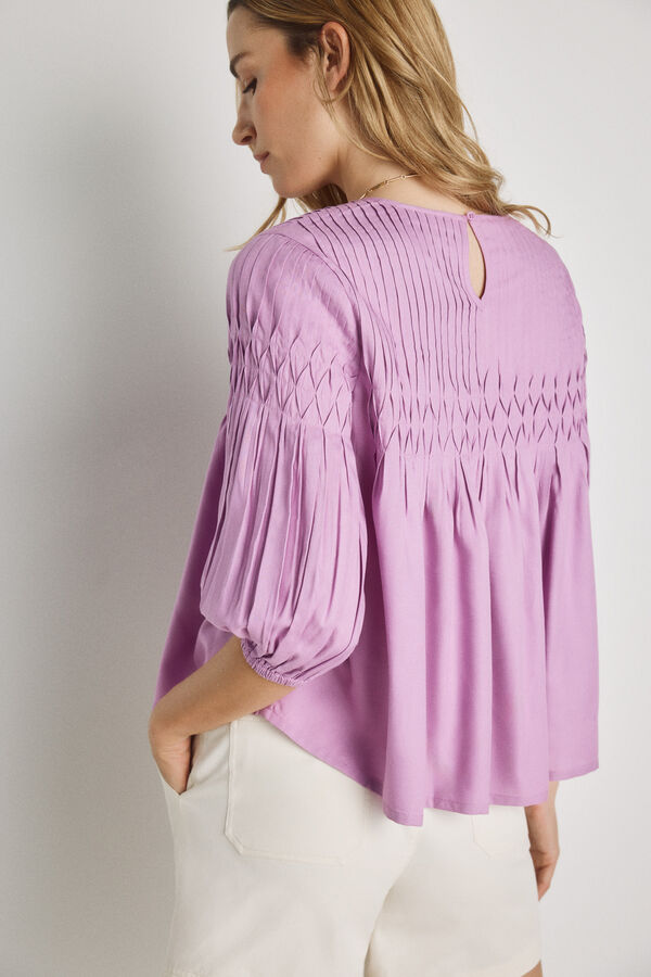 Milano Blusa gola redonda P&uacute;rpura
