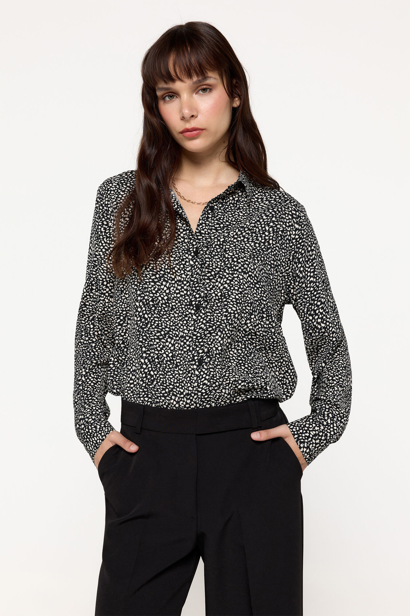 Milano Blusa com bolso fluido