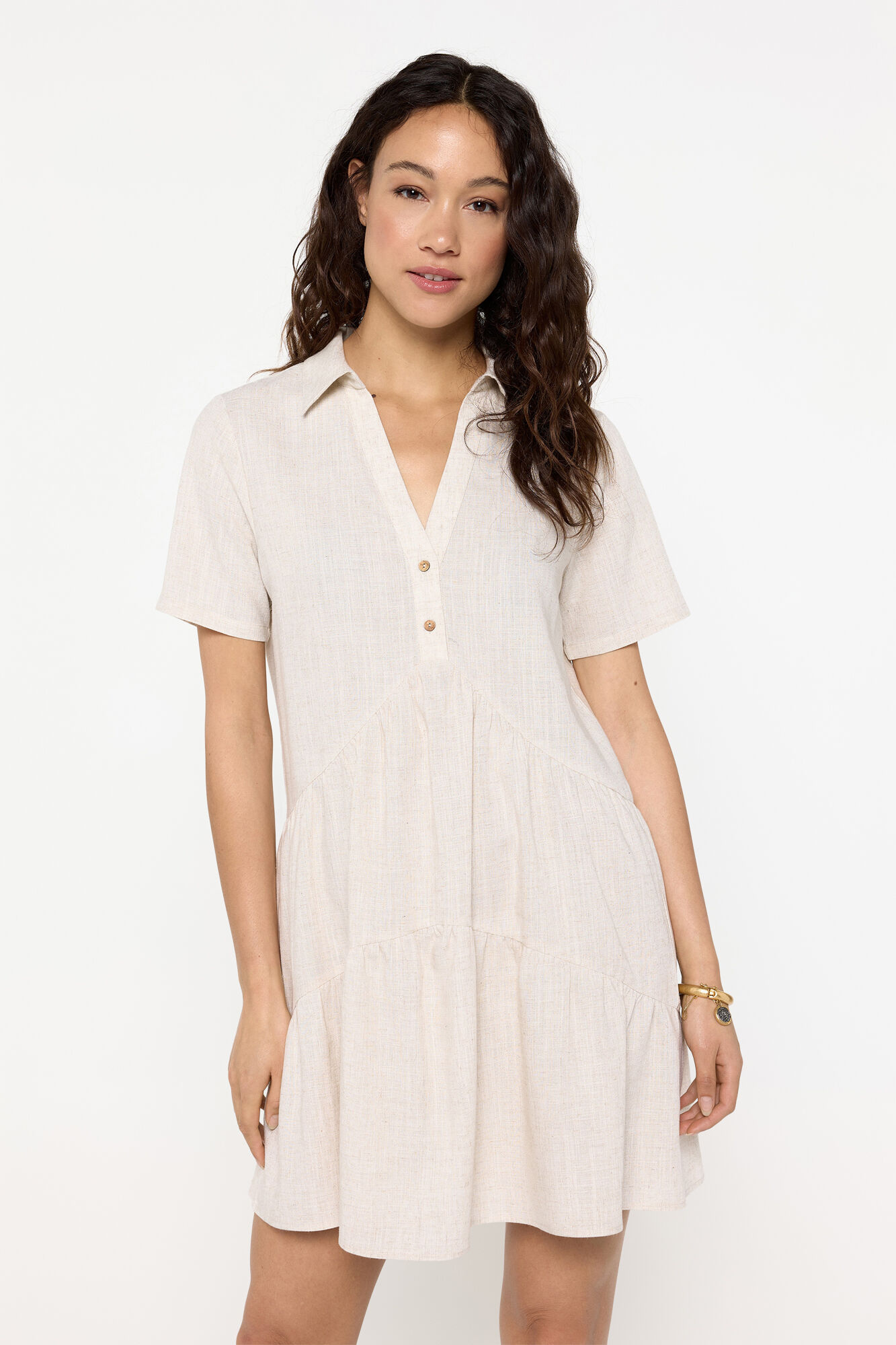 Milano Vestido corto tejido rustico corte fluido.