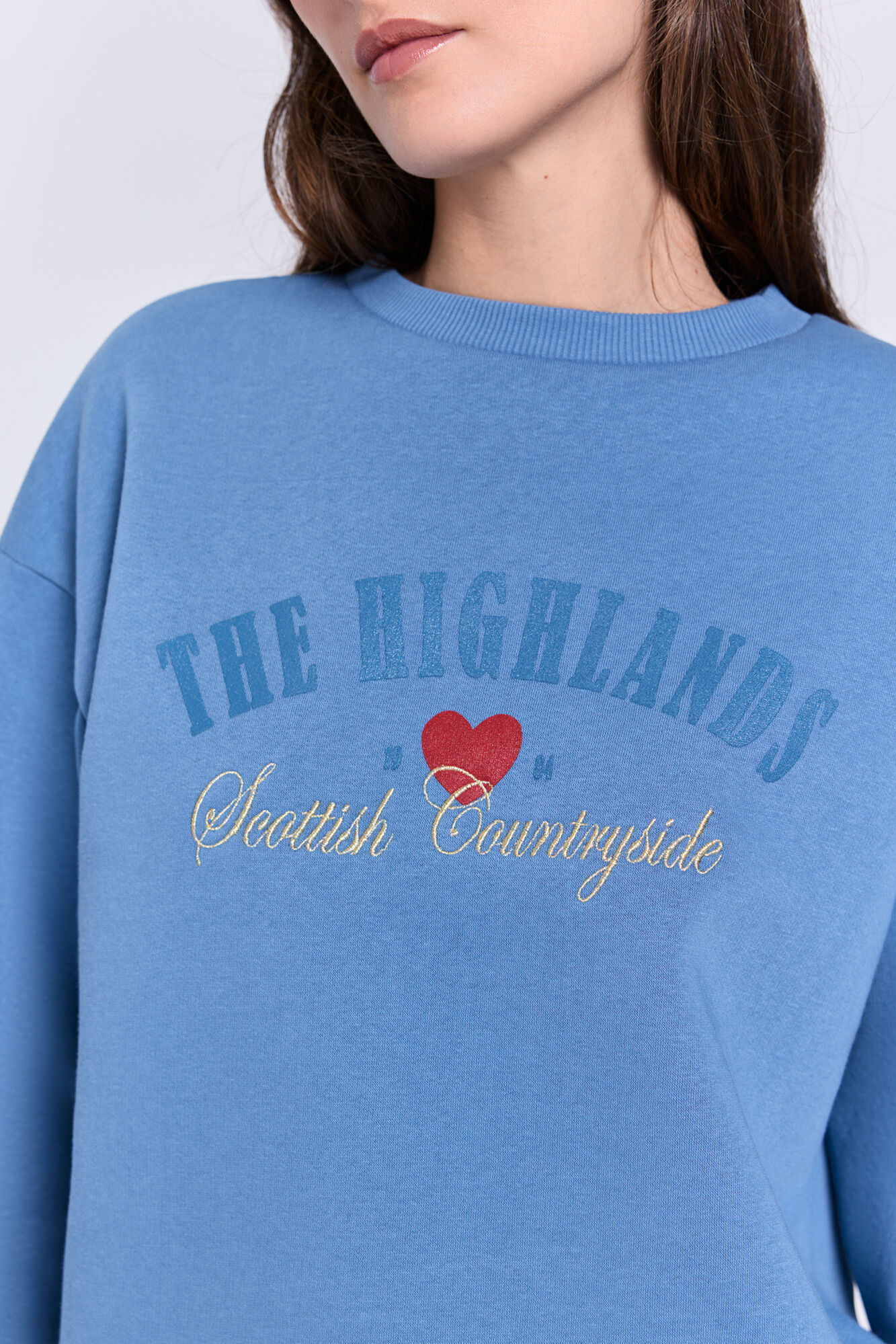 Milano Sweatshirt de l&atilde; azul com texto