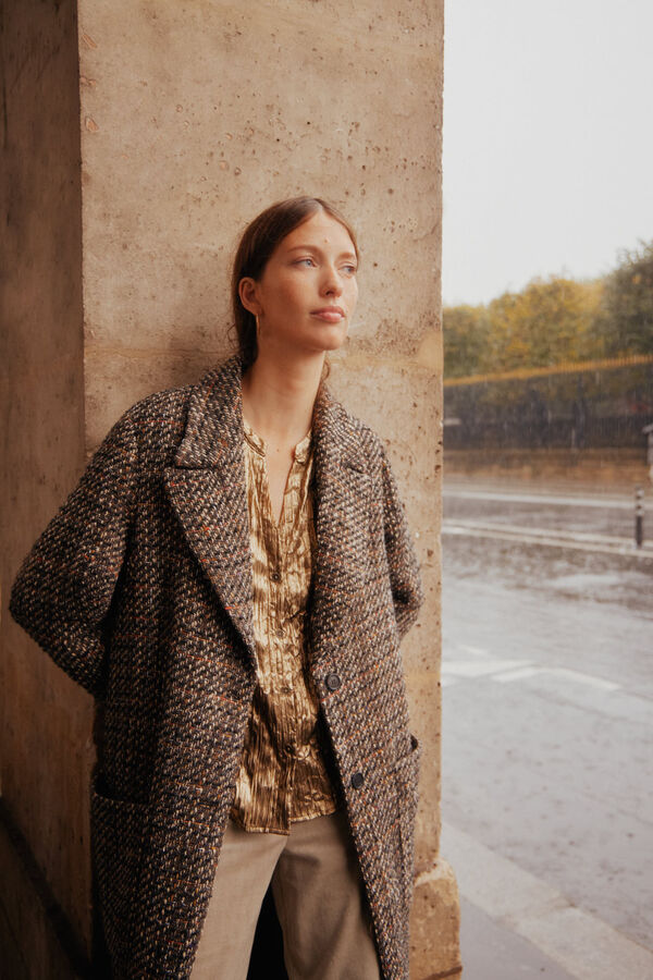 Hoss Intropia Fernanda. Blusa metalizada. Dorado