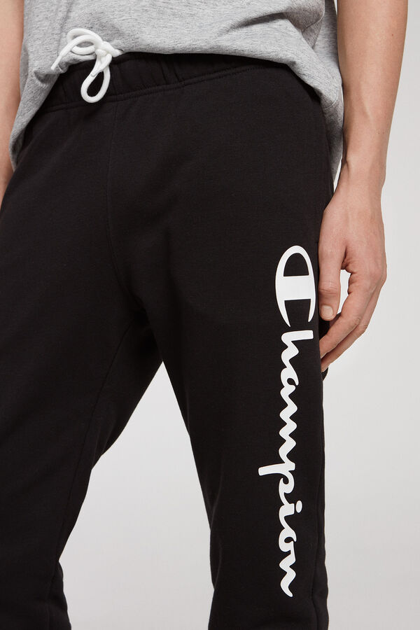Champion jogger pu&ntilde;o con logo en pierna negro