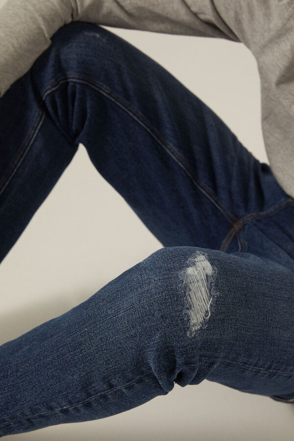 Springfield Jeans slim lavagem média-escura com rasgões azulado