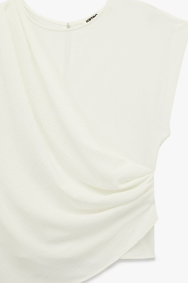 Koton Blusa assim&eacute;trica cruzada branco