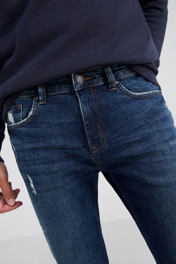 Springfield Jeans slim lavagem média-escura com rasgões azul