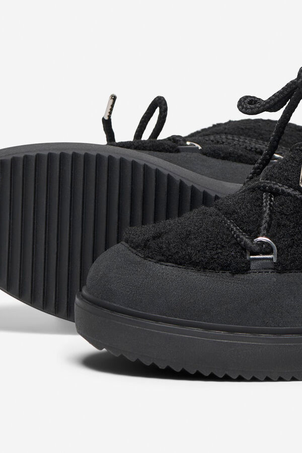 Only Bot&iacute;n de ante y borrego negro