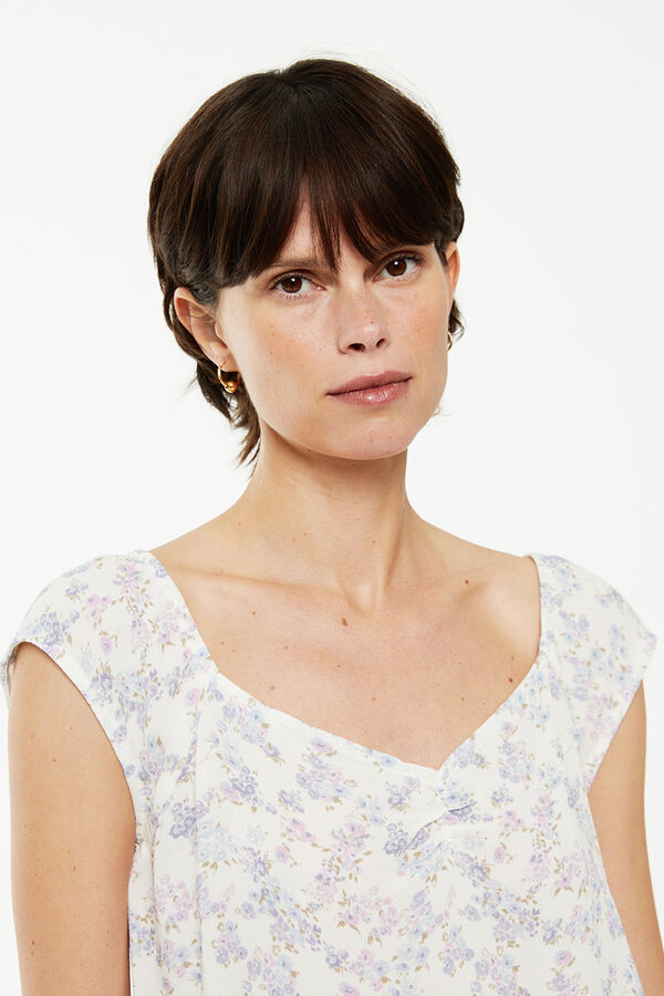 System Action Top estampado floral estampado