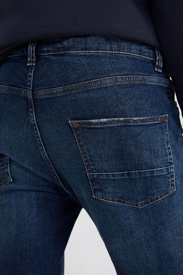Springfield Jeans slim lavado medio oscuro con rotos turquesa