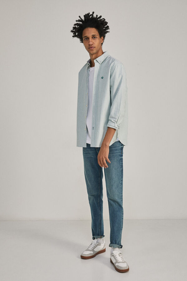 Springfield Jeans slim lavado medio ensuciado turquesa