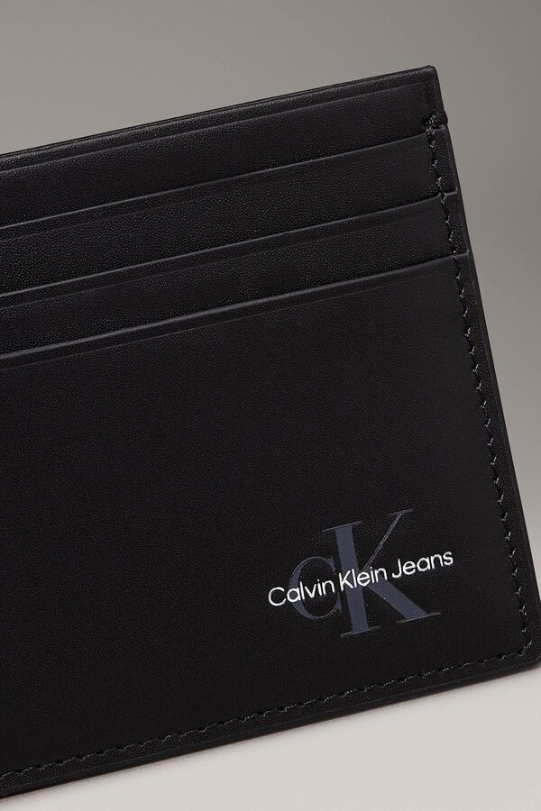 CK Jeans Monedero minimalista. negro