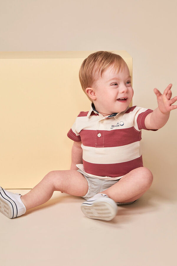 Gocco Polo estampado golf rosa burdeos