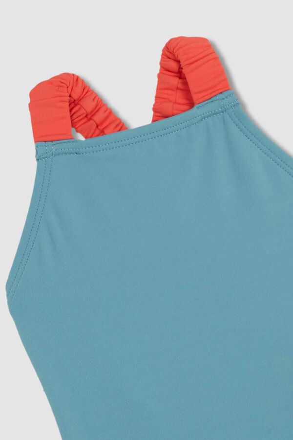 Gocco Ba&ntilde;ador detalles fosforitos gris gris