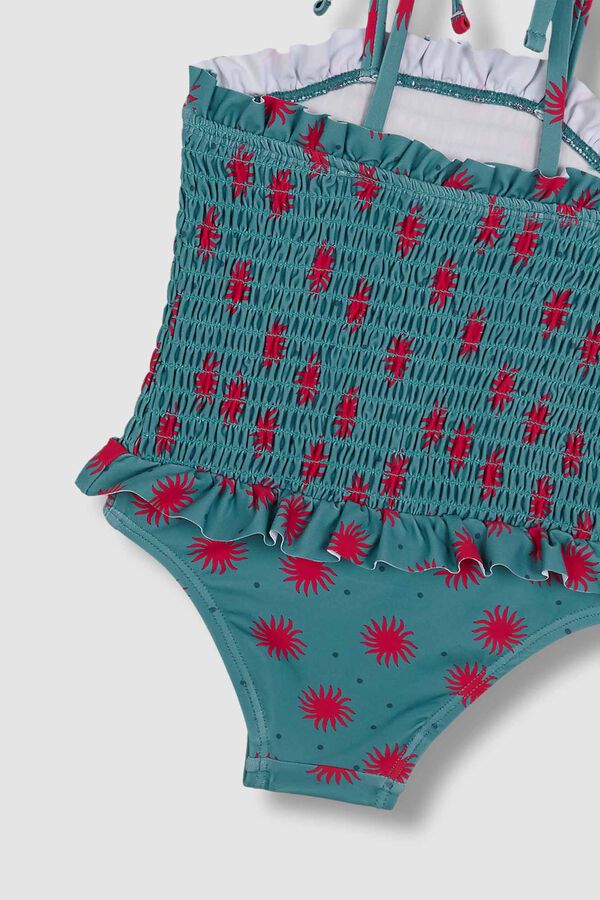 Gocco Ba&ntilde;ador smock de soles azul claro turquesa