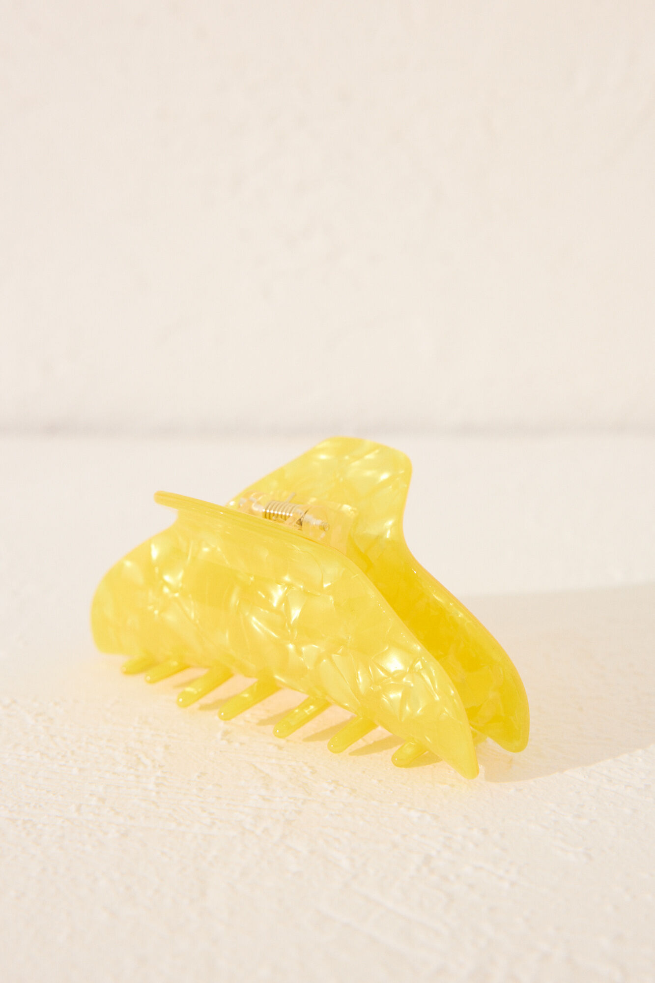 Women'secret Pinza pelo efecto marmoleado amarillo