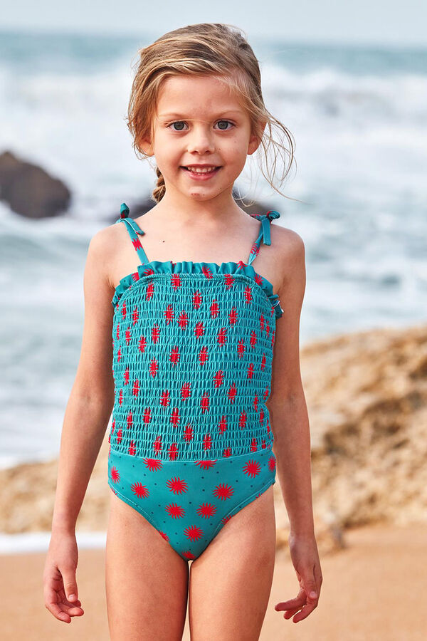 Gocco Mai&ocirc; azul claro com blusa de sol azul