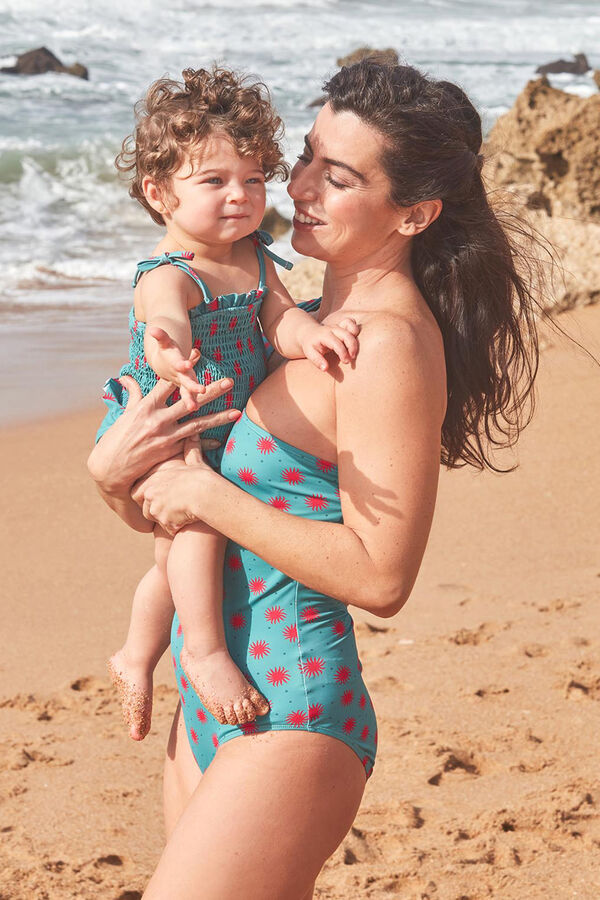 Gocco Ba&ntilde;ador smock de soles azul claro turquesa