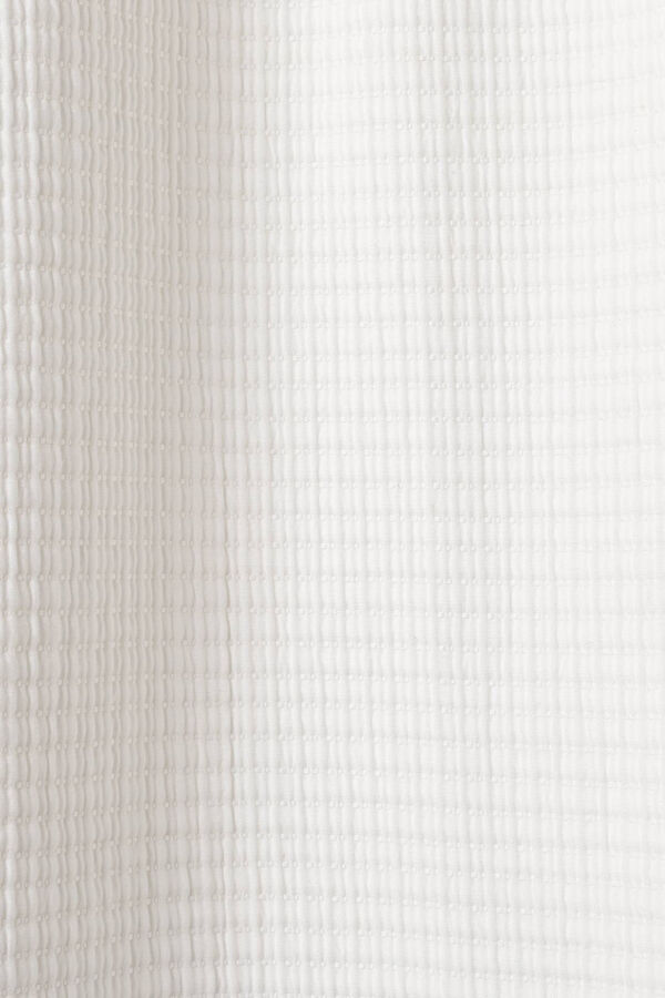 Textura Manta jacquard pesponto 120 x 180 cm. bege