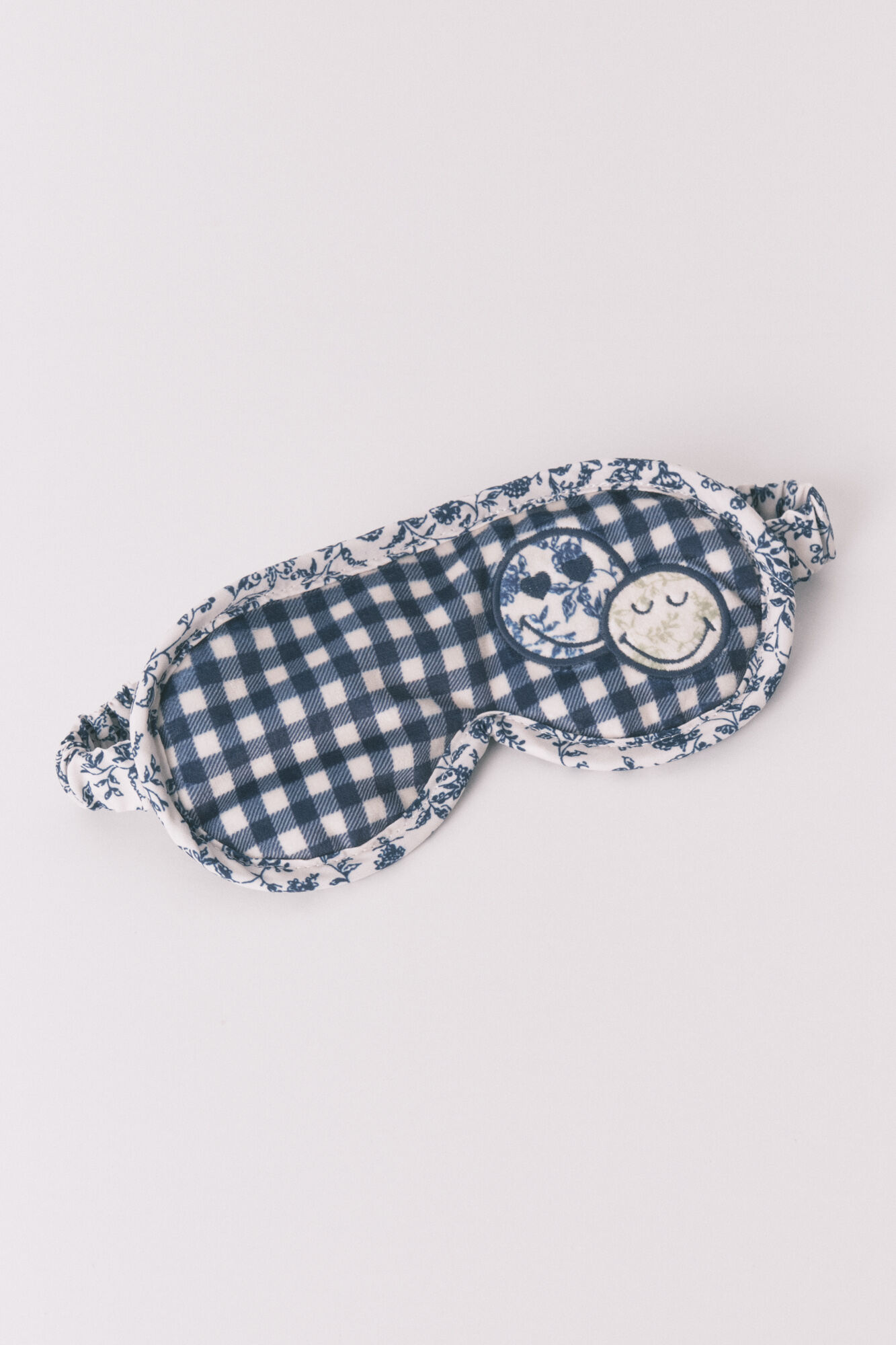 Women'secret M&aacute;scara de dormir SmileyWorld&reg; com padr&atilde;o vichy azul