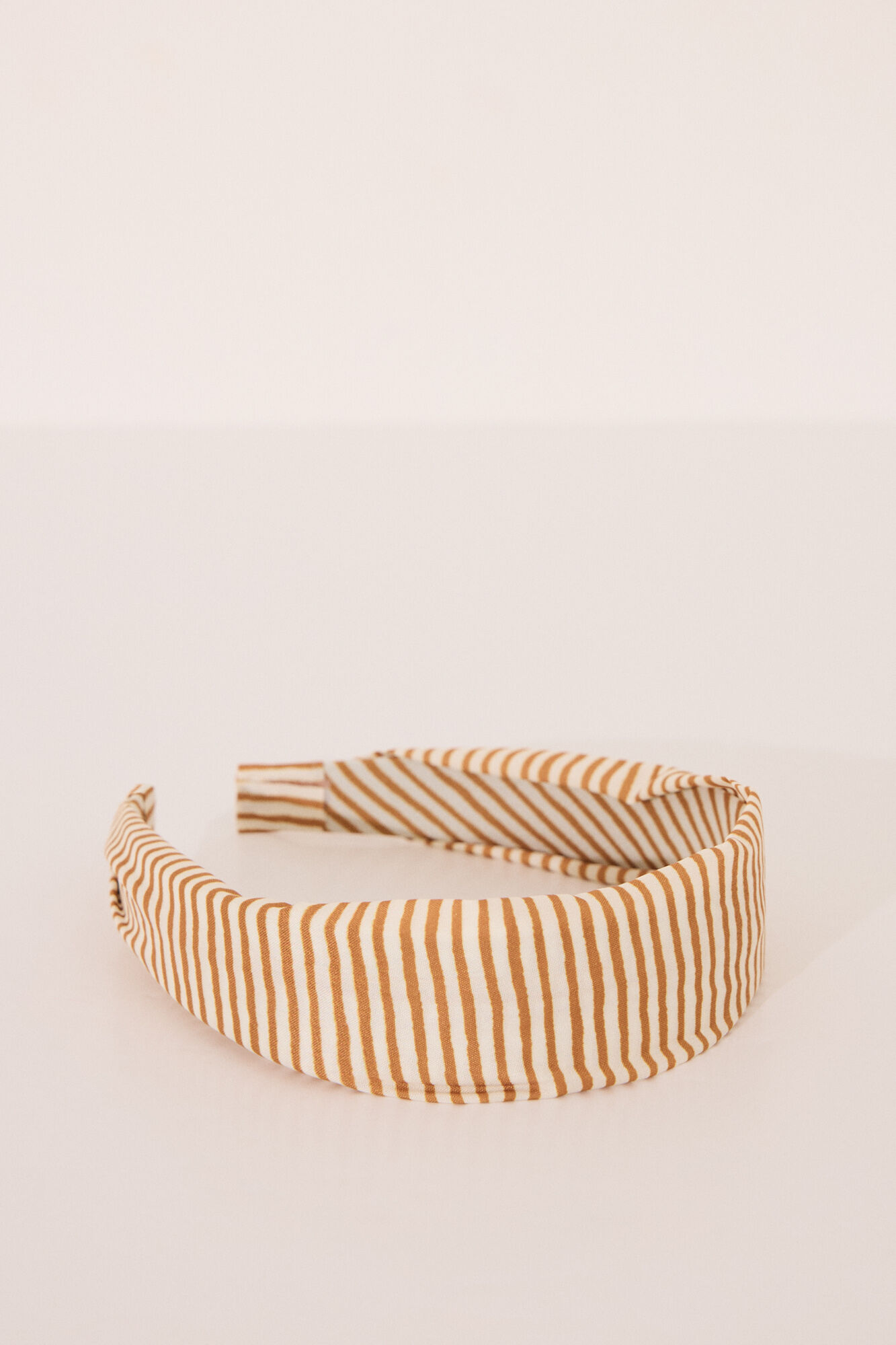 Women'secret Diadema estampada amarilla rayas