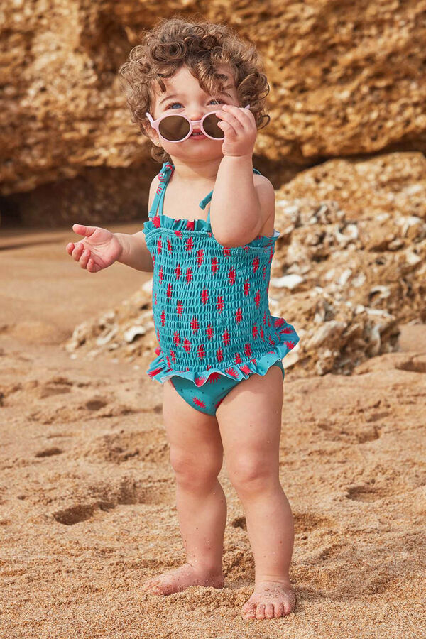 Gocco Ba&ntilde;ador smock de soles azul claro turquesa